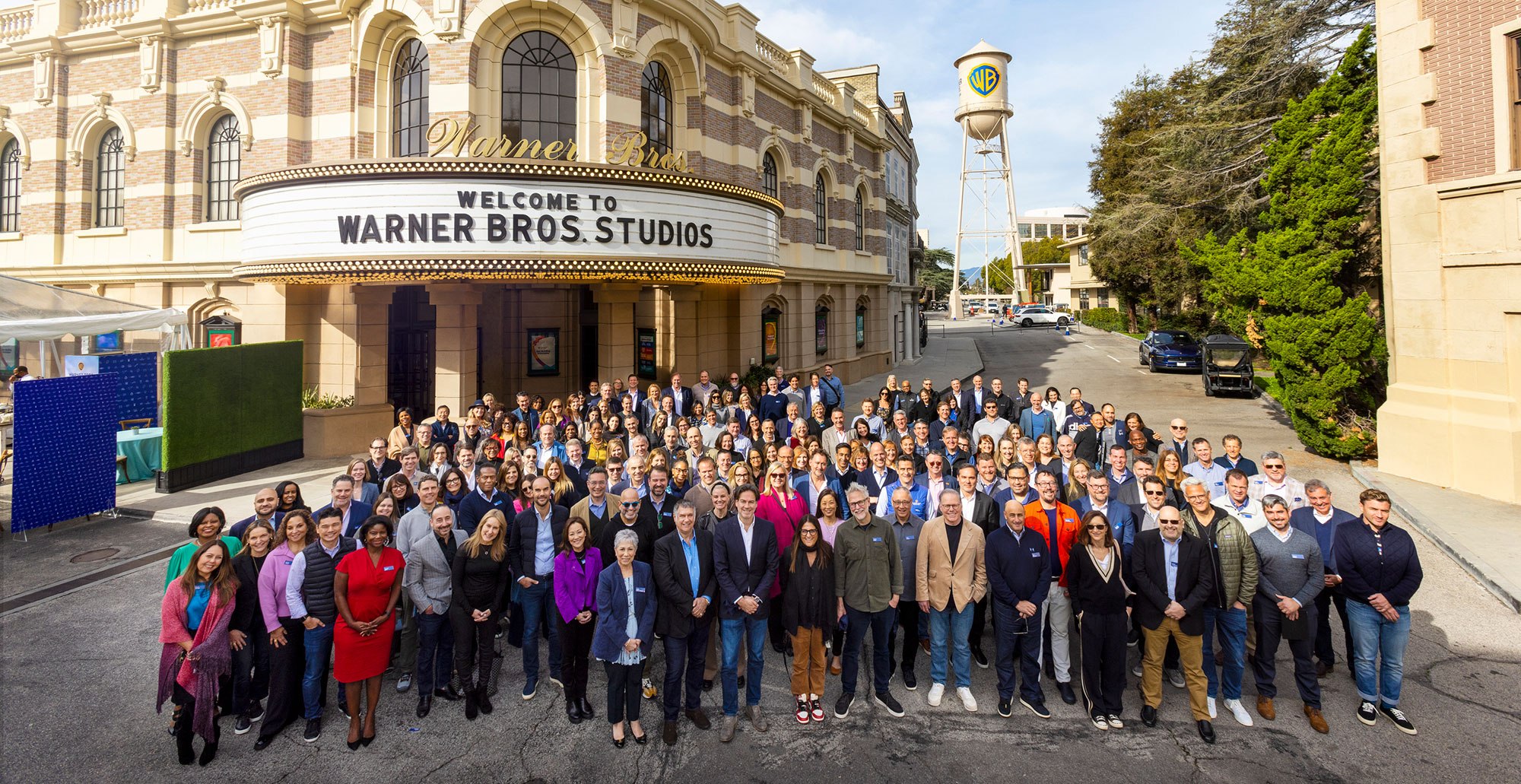 Photo of Warner Bros. Discovery's global senior leadership team gathered for a group photo on Warner Bros. Studios lot